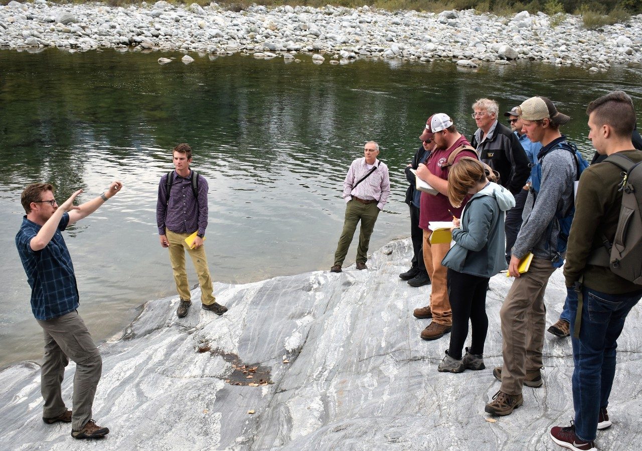 Dr. Mark Caddick discussing melting and deformation of the lower crust during the Study Abroad program in the Maggia Valley, close to the Swiss-Italian border (October 2018). 