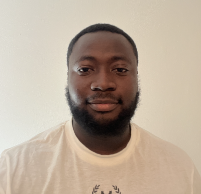 Headshot of Ola Olorunsaye